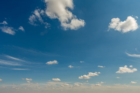 Landscape with blue sky and Cumulus white clouds beautiful blue sky background. Beauty clear cloudy in sunlight calm bright winter or summer windy air background.の写真素材