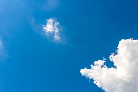 Landscape with blue sky and Cumulus white clouds beautiful blue sky background. Beauty clear cloudy in sunlight calm bright winter or summer windy air background.の写真素材