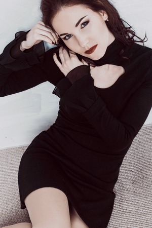 girl model sits broodingの写真素材