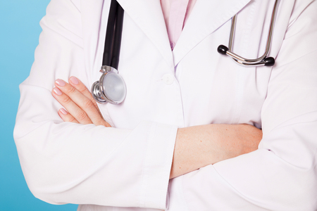 the hands of doctors and her stethoscopeの写真素材