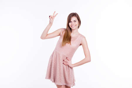 nice woman girl shows a two-finger victoryの写真素材