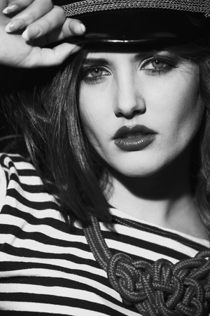 black and white photography of female models in a striped t-shirtの写真素材
