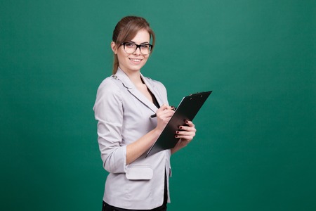 girl teacher with a folder and penの写真素材