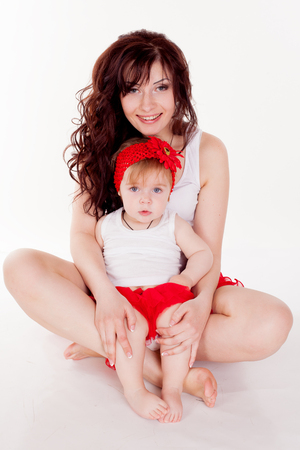 mother and little daughter in studioの写真素材