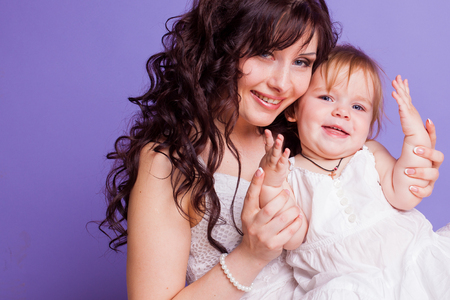 mother and daughter play in studioの写真素材