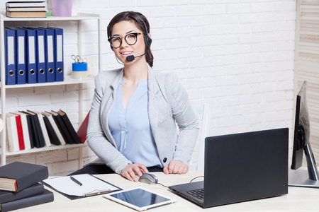 the girl in the Office as call center operatorの写真素材
