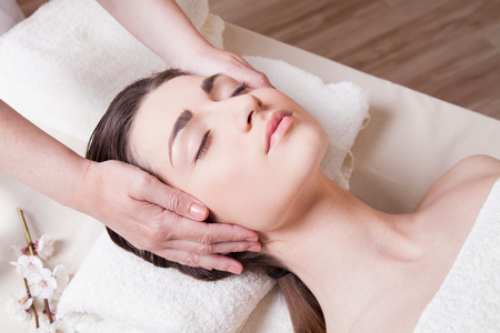 girl doing massage in the Spaの写真素材
