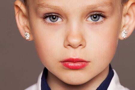 Portrait of the face of a baby girlsの写真素材