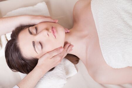 nice girl doing massage in the Spaの写真素材