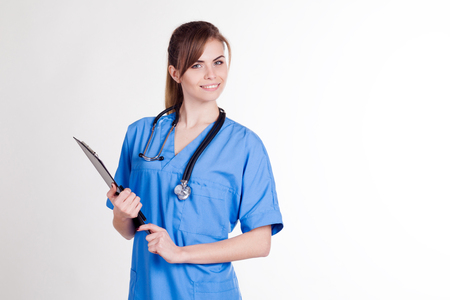girl doctor with a folder and a stethoscopeの写真素材