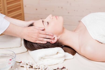 nice girl doing massage in the Spaの写真素材