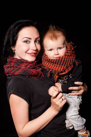 mom and young boy son in foto studioの写真素材