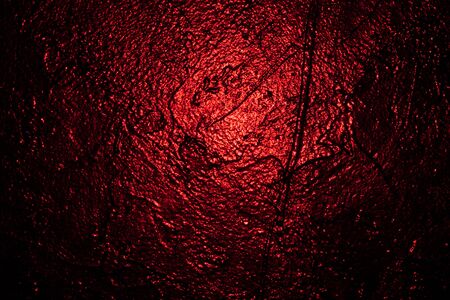 red textured wall in studio background wall textureの写真素材