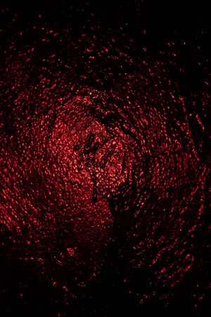 red textured wall in studio background wall textureの写真素材