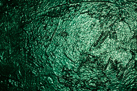 green textured wall in studio background wall textureの写真素材