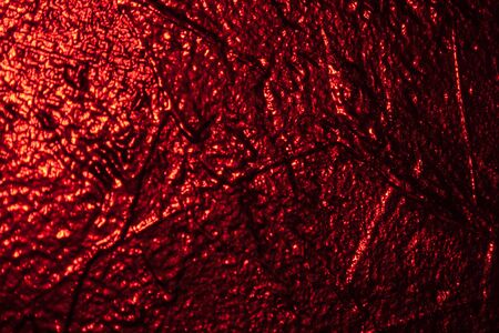red textured wall in studio background wall textureの写真素材