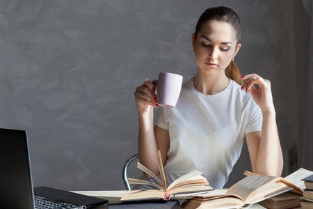 girl reading book education young read grassの写真素材