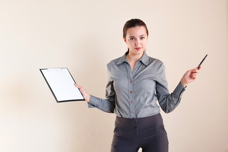 girl in business style with a folderの写真素材