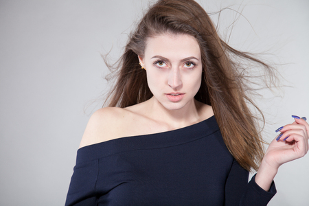 beautiful girl is posing in the Studioの写真素材