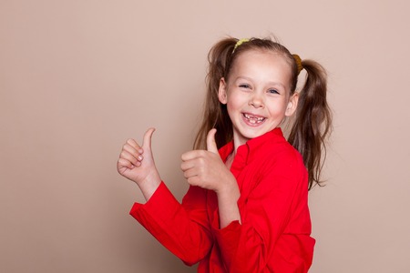 loss of primary teeth the girl smileの写真素材