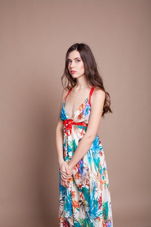 girl in colored dress posing smilesの写真素材