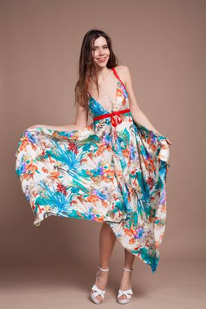 girl in colored dress posing smilesの写真素材