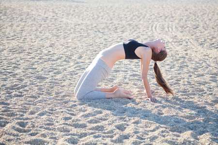 beautiful girl engaged in fitness Yogaの写真素材