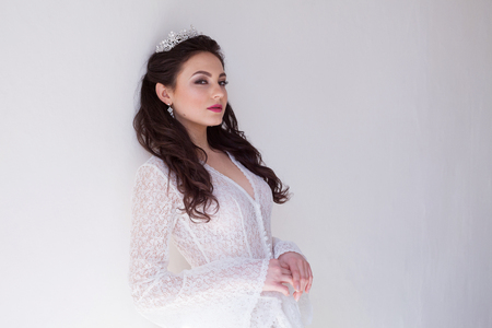 beautiful bride posing svadebnoaja hairstyle and dress vintageの写真素材