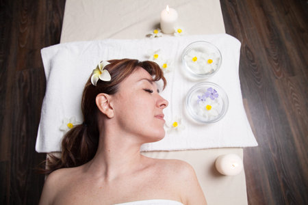 the beautiful girl lying in Spa massage sauna