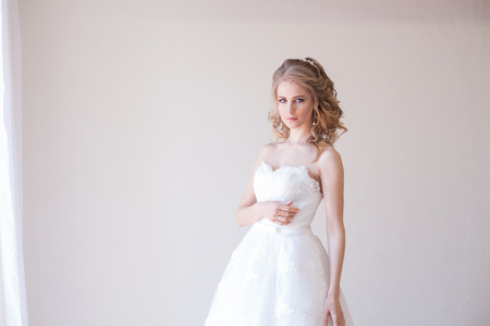 beautiful bride posing wedding hairstyle and dressの写真素材