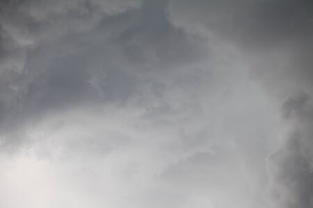 dark gray clouds of bad weather before the rainの写真素材