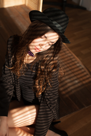 sexy girl lying on the floor in his underwearの写真素材