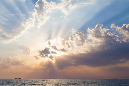 Beach Sunset Ocean rays of the Sun from the clouds