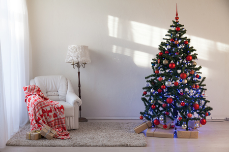 Christmas tree with Christmas gifts in White Hall on Christmasの写真素材