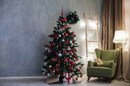 room with Christmas decorations Christmas tree giftsの写真素材