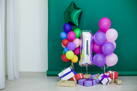 balloons of different colors with gifts for the holidayの写真素材