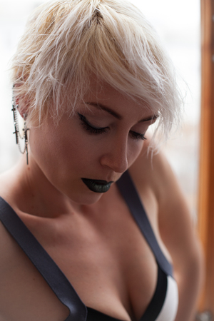 fashion girl blonde with short hair fashionの写真素材