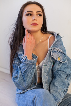 beautiful girl in jeans clothes fashionの写真素材