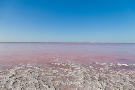 Salt Lake landscape with water pink and blue seaの写真素材