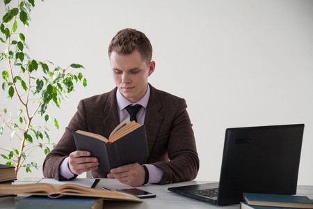 business man working at a computer in the Officeの写真素材