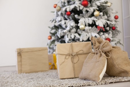 Christmas tree with presents, Garland lights new yearの写真素材