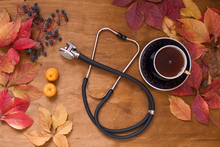 autumn disease medicine red berries yellow leavesの写真素材