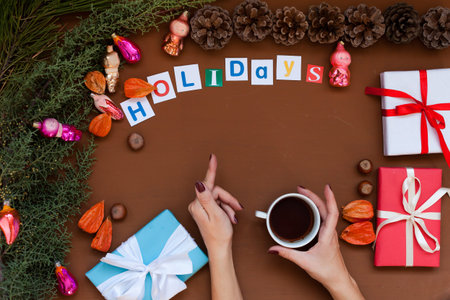 Christmas background hand new year coniferous branches presents winter postcard
