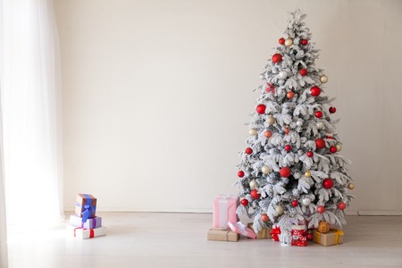 Christmas Interior white room greeting card new year tree giftsの写真素材