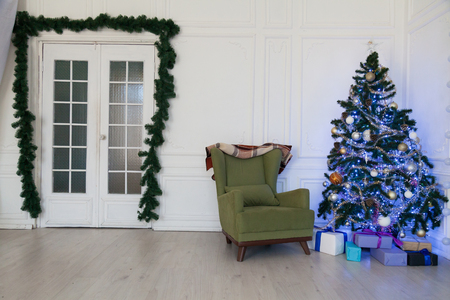 Christmas tree Garland lights new year holiday gifts white homeの写真素材