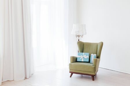 vintage chair with gifts for the holidayの写真素材