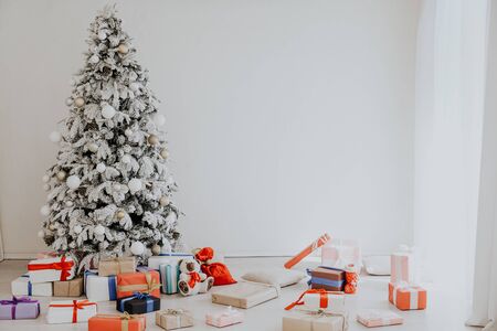 decor with White Christmas tree Merry Christmas new year giftsの写真素材