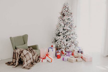Christmas Home Interior with White Christmas tree giftsの写真素材