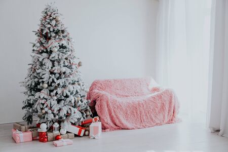 Christmas tree with presents new year's White roomの写真素材