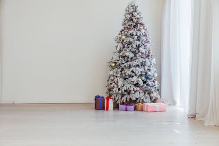 new year Christmas tree winter holiday gifts interior decor postcardの写真素材